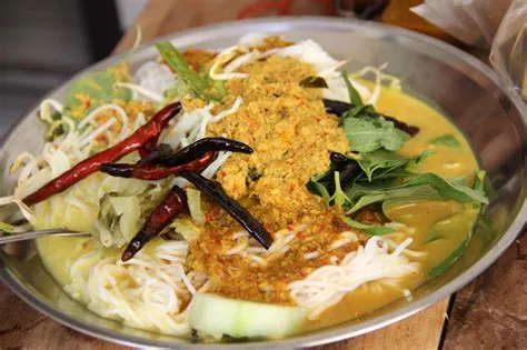  Khanom Jeen Nam Ya A Decadent Curry Dish Drizzled with Aromatic Coconut Cream