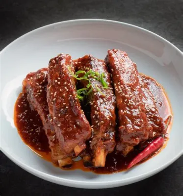  Shaoxing Wine-Braised Pork Ribs: Savoring Umami Depth While Indulging in Tender Melt-in-Your-Mouth Goodness?